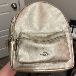 Coach backpack in gold
